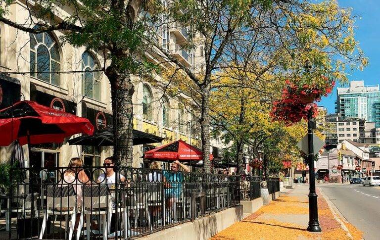 View of the downtown area in Burlington, Ontario, which includes office buildings, pedestrian-friendly streets and indoor and outdoor restaurants.